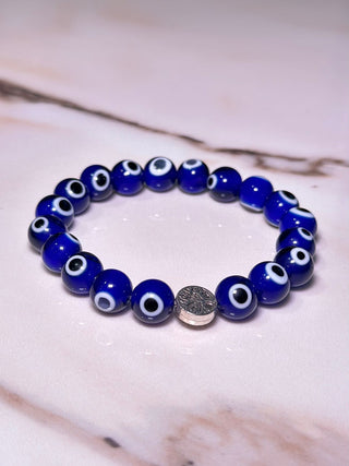 Pure Evil Eye Bracelet - It brings good luck by carrying an evil eye charm or casting out an evil symbol its said to magically bestow good luck , health and happiness to its beholder.