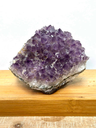 Awakening Amethyst Cluster - A powerful and protective stone that guards against psychic attacks, transmuting the energy into love and protecting the wearer from all types of harm